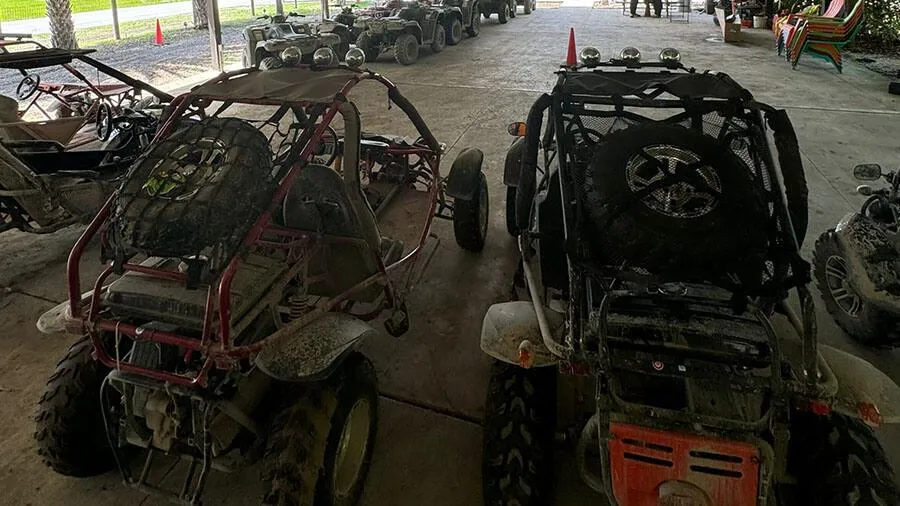 UTVs parked at an off-road facility