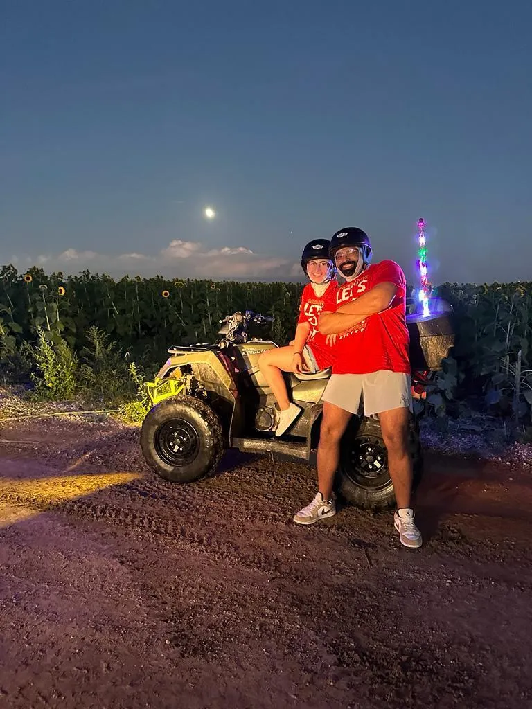 Riders on ATVs during a night tour